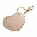 The BG746 keychain by Bagbase features a heart-shaped design with a textured surface, complete with a gold-colored keyring and clasp.