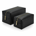 Two Bagbase BG749 toiletry bags, one larger and one smaller, feature gold zippers and are side by side on a white background.