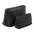 Two Bagbase BG751 pouches in black, each a different size, standing upright against a plain background.
