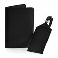 Bagbase BG755 black leather passport holder paired with a matching luggage tag displayed against a white background.