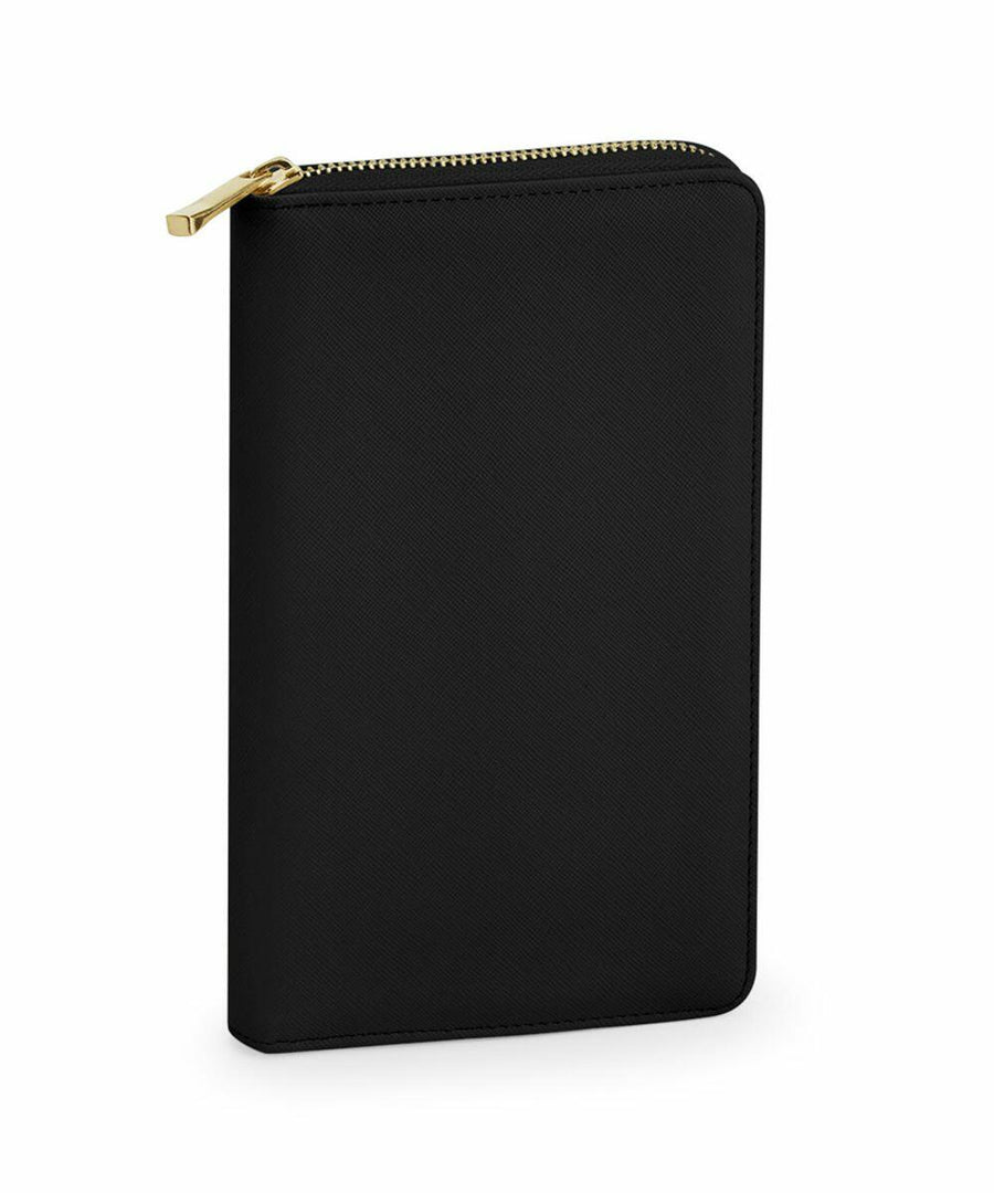 A Bagbase BG757 black leather notebook cover featuring a gold-colored zipper.