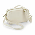 Introducing the BG758 by Bagbase: a cream rectangular handbag featuring elegant gold hardware, a secure zipped top, a convenient front pocket, and an adjustable strap for versatile styling.