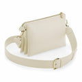 Cream-colored BG759 by Bagbase, featuring gold accents and an adjustable strap.