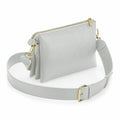 The BG759 by Bagbase is a light gray crossbody bag featuring gold hardware, an adjustable strap, zippered closure, and multiple compartments.
