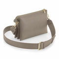 Introducing the BG759 by Bagbase, a taupe three-compartment crossbody bag featuring a wide adjustable strap and gold hardware, complete with a zipper and two clasps. It boasts a textured leather finish and a sleek, modern design.