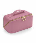 A pink rectangular toiletry bag from Bagbase, model BG762, featuring a handle and a gold zipper, is displayed against a white background.