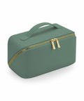 The Bagbase BG762 is a rectangular toiletry bag in green, featuring a gold zipper and a handle on top. The bag is closed, with two pulls that meet at the center of the zipper. It has a smooth fabric texture.
