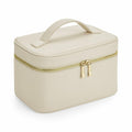 The Bagbase BG763 is a beige, rectangular toiletry bag featuring a handle and a dual gold zipper on top.