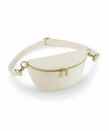 Bagbase BG766, a cream-colored fanny pack featuring gold zippers and an adjustable strap, set against a white background.