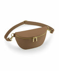 The Bagbase BG766 is a half-moon shaped brown crossbody bag featuring gold zippers and clasps. It comes with an adjustable strap for versatile wearing options, and is made from either leather or faux leather.