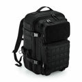 The BG850, a tactical backpack by Bagbase, features multiple compartments, zippers, and adjustable straps. It's shown against a plain white background.
