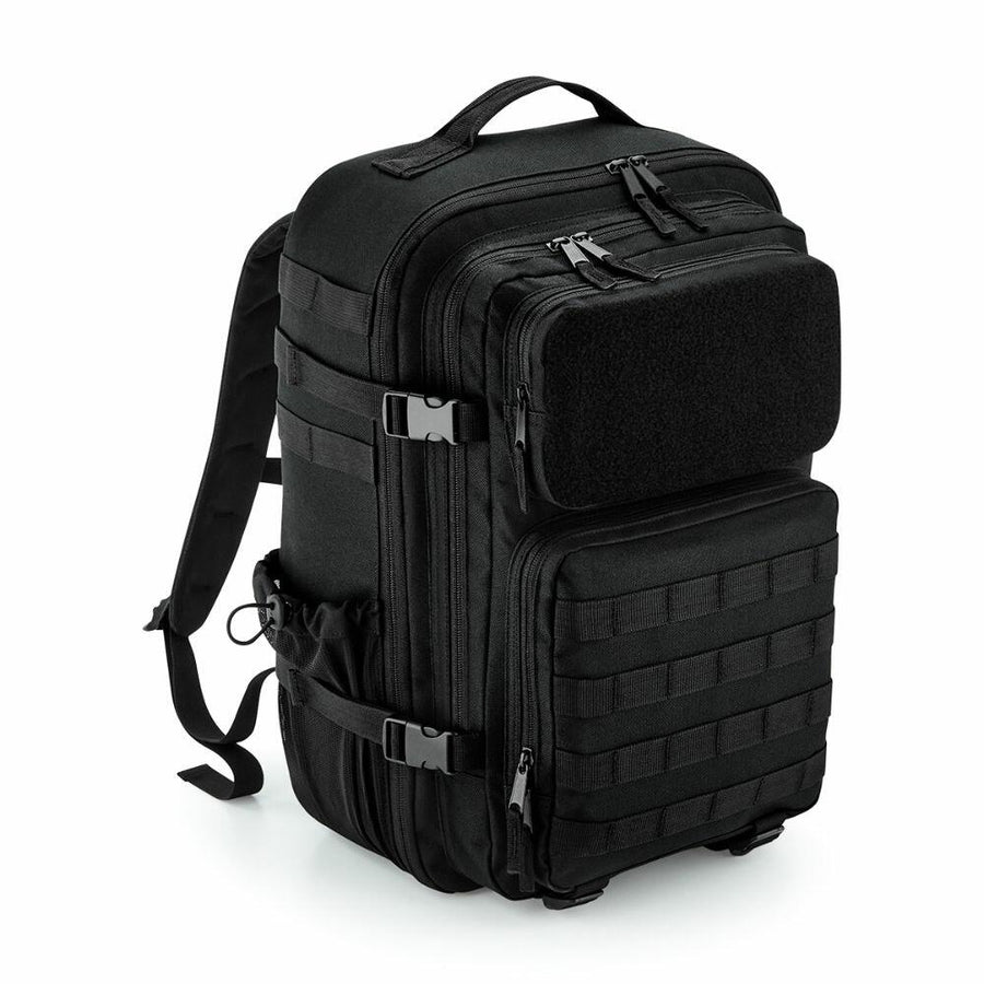 The BG850, a tactical backpack by Bagbase, features multiple compartments, zippers, and adjustable straps. It's shown against a plain white background.