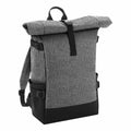 The Bagbase BG858 roll-top backpack, featuring a gray and black design with adjustable straps and side buckles, is displayed against a white background.
