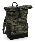Bagbase BG858 backpack featuring a camouflage pattern, roll-top closure, a black base, and adjustable straps.