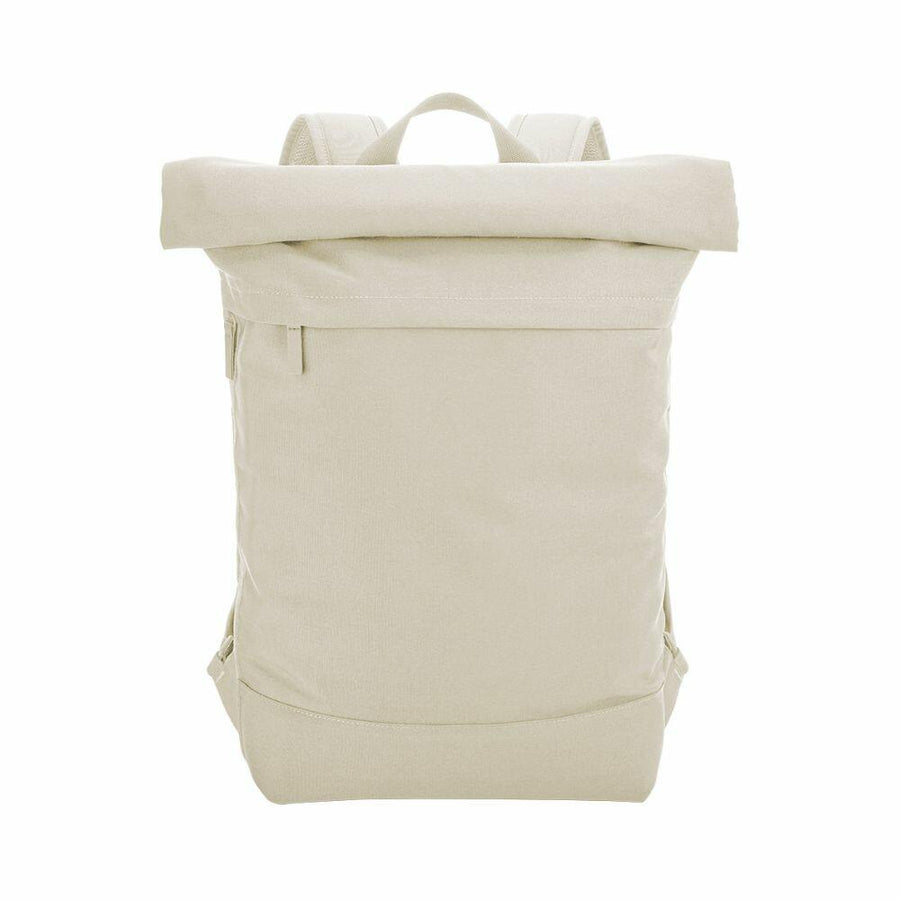 A Bagbase BG870 backpack in plain beige, featuring a roll-top design and a front zipper pocket, is displayed against a white background.