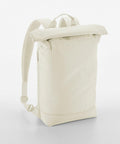 A minimalist beige backpack with a roll-top design, a front zippered pocket, and padded shoulder straps. The material has a smooth, clean finish. The Bagbase BG871 is standing upright on a plain white background.