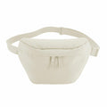 The Bagbase BG875 is a beige fanny pack featuring an adjustable strap and a zipper closure.