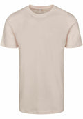 A BY004 t-shirt from Build Your Brand, featuring a simple and classic design in light beige, displayed on a flat surface.