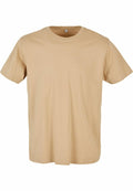 Product BY004 by Build Your Brand is a plain beige t-shirt featuring short sleeves and a round neckline, displayed against a white background.