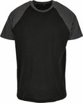 The BY007 raglan t-shirt by Build Your Brand in black and dark gray, showcased on a plain background.