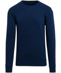 The BY010 from Build Your Brand is a plain navy blue crewneck sweatshirt with long sleeves, featuring a simple design with ribbed cuffs and hem.