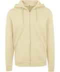 The BY012 by Build Your Brand is a beige zip-up hoodie featuring a hood with drawstrings and front pockets. It is crafted from soft, comfortable fabric, making it ideal for casual wear.