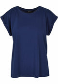 The product showcases a relaxed fit BY021 short-sleeve T-shirt by Build Your Brand, featuring rolled-up sleeves and a plain navy blue design set against a white background.