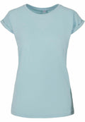 A Build Your Brand BY021 T-shirt in plain light blue is shown against a white background. The shirt features a simple design with short sleeves, a round neckline, and subtle stitching details.
