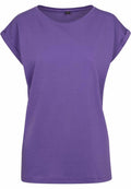 The "BY021" by Build Your Brand is a plain purple T-shirt featuring short, rolled-up sleeves, showcased against a white background.