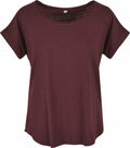 BY036 by Build Your Brand features a plain burgundy T-shirt with short sleeves and a round neckline, showcased against a white background.