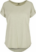 The BY036 by Build Your Brand is a plain, light beige T-shirt featuring a round neckline and rolled-up sleeves. It offers a relaxed fit with a slightly longer back hem.