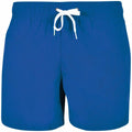 The BY050 swim shorts from Build Your Brand feature a blue color with a white drawstring and are showcased against a plain background.