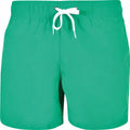 BY050 swim trunks by Build Your Brand, featuring a green color and white drawstring at the waist.