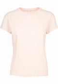 A Build Your Brand BY052 light pink short-sleeve t-shirt displayed on a white background.