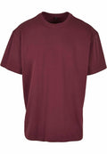 The BY102 from Build Your Brand is a plain maroon t-shirt set against a white background, featuring short sleeves and a round neckline.