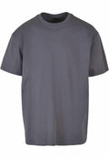 Displayed against a white background is the BY102 by Build Your Brand, a plain gray T-shirt featuring a crew neck and short sleeves. The fabric appears smooth with a slightly loose fit, perfect for casual wear.