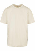 The BY102 from Build Your Brand is an off-white, short-sleeve T-shirt featuring a round neckline. Set against a white backdrop, the shirt's straightforward and timeless design, along with its relaxed fit, is prominently showcased.
