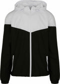 The BY129 jacket by Build Your Brand features a black and white design, a hood, a front zipper, and two zippered pockets.