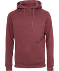 A maroon BY137 hoodie by Build Your Brand featuring a front pocket and drawstrings.