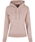 The Build Your Brand BY139 hoodie in plain pink features a kangaroo pocket and drawstrings.
