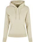 The BY139 hoodie from Build Your Brand is featured against a white background. It comes in beige and includes a front pocket and drawstring hood, along with ribbed cuffs and hem for a casual, comfortable look.