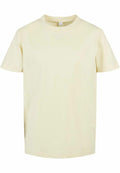 The Build Your Brand BY158 is a plain T-shirt featuring a light yellow hue, short sleeves, and a round neck. The fabric offers a soft and smooth texture, making it ideal for casual wear. It's showcased against a simple white background.