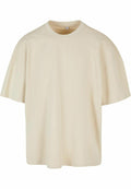 The BY163 T-shirt from Build Your Brand, featuring a plain beige color with short sleeves and a round neckline, is displayed against a white background.