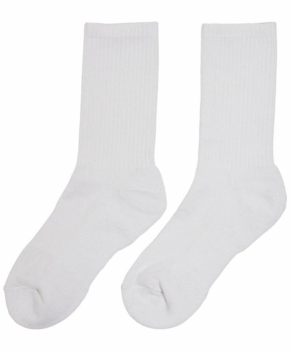 A pair of Build Your Brand BY201 plain white crew socks displayed side by side against a white background.