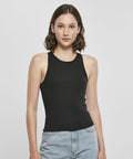 A woman with shoulder-length brown hair wearing a BY208 from Build Your Brand stands against a plain background.