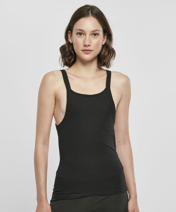 A person with shoulder-length brown hair is wearing a Build Your Brand BY209 and standing against a plain white background.