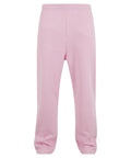 Trackwear jogging bottoms in light pink, featuring an elasticated waistband and straight legs with a minimalist design, shown against a white background.