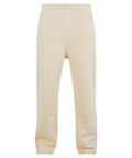 Trackwear beige tracksuit bottoms with an elasticated waistband and straight legs, shown against a plain white background.