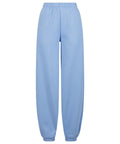 Tracksuit bottoms in light blue, featuring an elasticated waistband and ankle cuffs. Simple, unadorned design displayed on a white background.