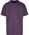 A relaxed-fit, short-sleeved purple T-shirt with a round neckline is displayed on a white background; it features a plain design with no visible logos or patterns.